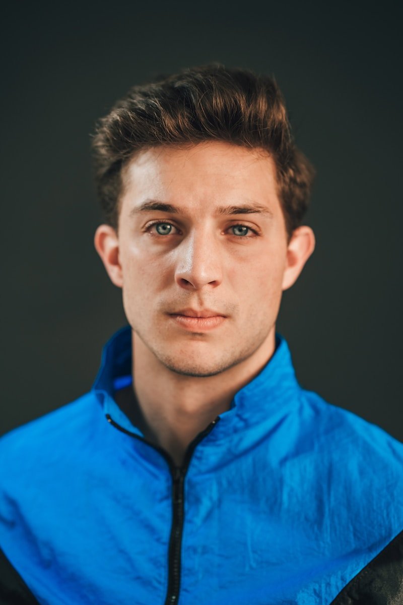 man in blue button up shirt